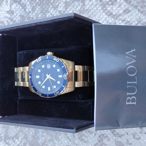 Bulova Other - (SOLD)Bulova Men's Quartz Gold-Tone Date Indicator Blue Dial Watch 43mm 98A197